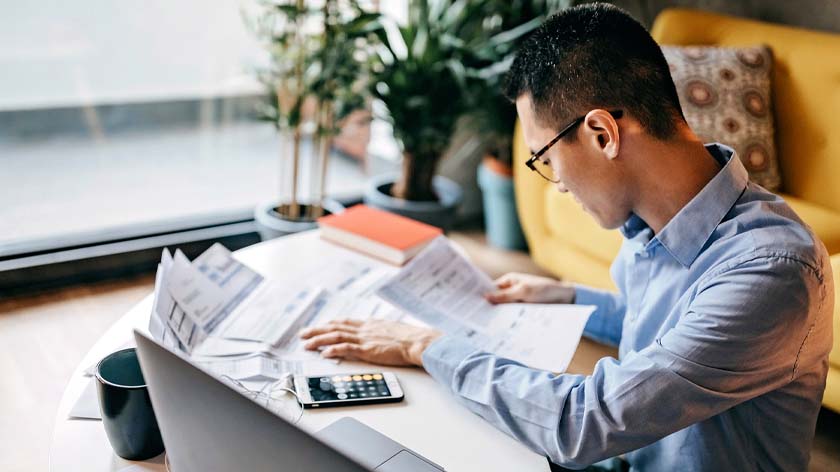 1767973394116_photo man calculating financial bills 16x9